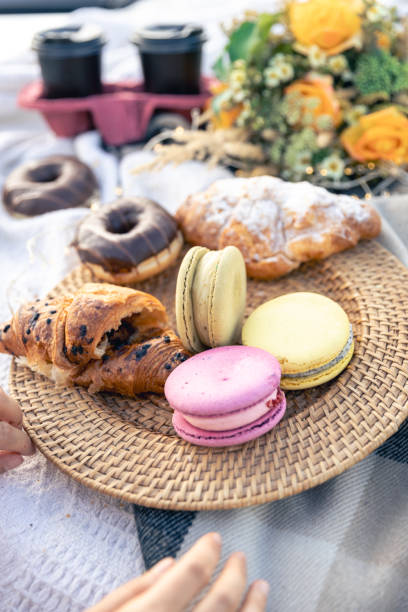 istock Macaroon croissants and donuts close up, picnic concept. 1674010250