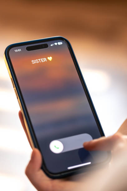 istock Smartphone in child hands with Incoming sister call on a screen. 1674015865