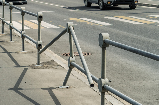 Damaged road fence as a result of a traffic accident