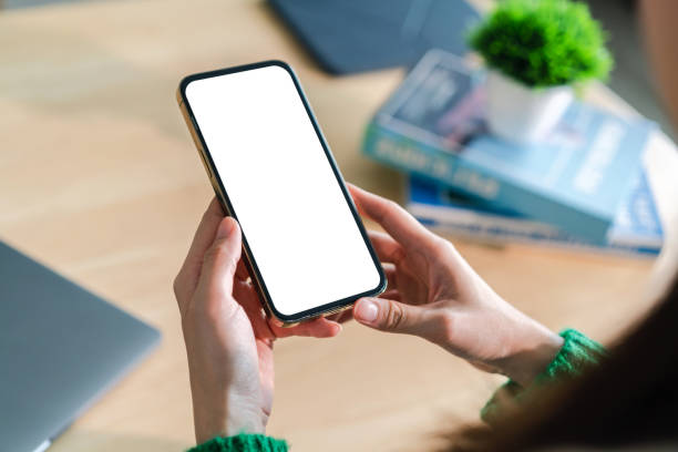 istock Human working on modern smartphone with blank white mobile screen for advertising, mockup, technology, advertising, search information, creative design, social media, online marketing, chat, phone 1674032538