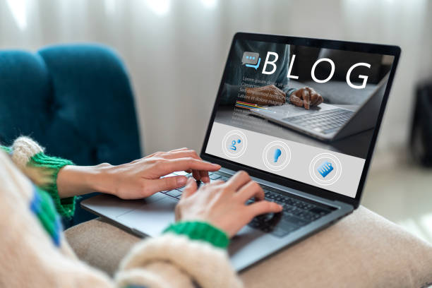 istock Social media online content, freelance worker, working online, content creator, woman using laptop, woman reading blog online on computer at home 1674032554