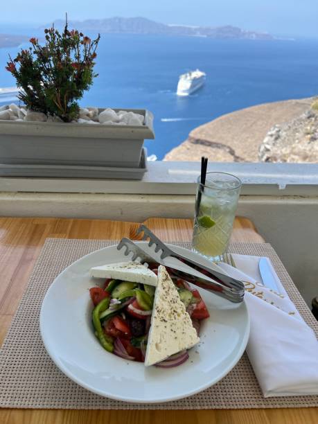 istock Santorini - Greek Salad with a view 1674058099