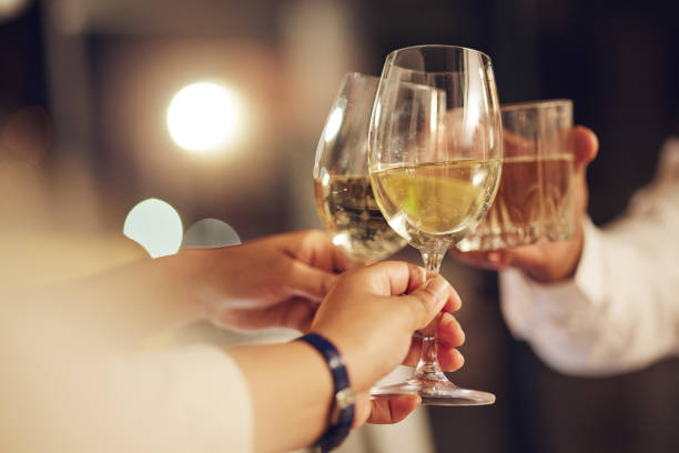 istock Celebration, people hands and toast alcohol drinks for achievement, congratulations party or luxury gala vent. Support, night friends and group cheers with champagne, sparkling wine or glass beverage 1674061424
