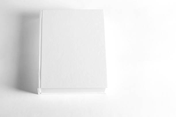 istock Mockup of closed blank square book at white textured paper background 1674102214