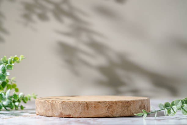 istock Wooden podium with leaves 1674125959