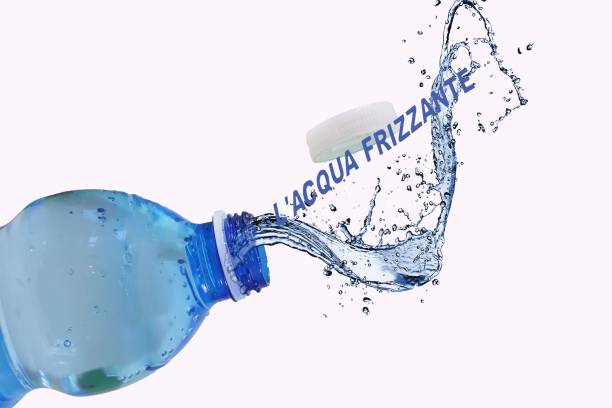 istock an ice cube is being thrown into water to make a splash 1674130044