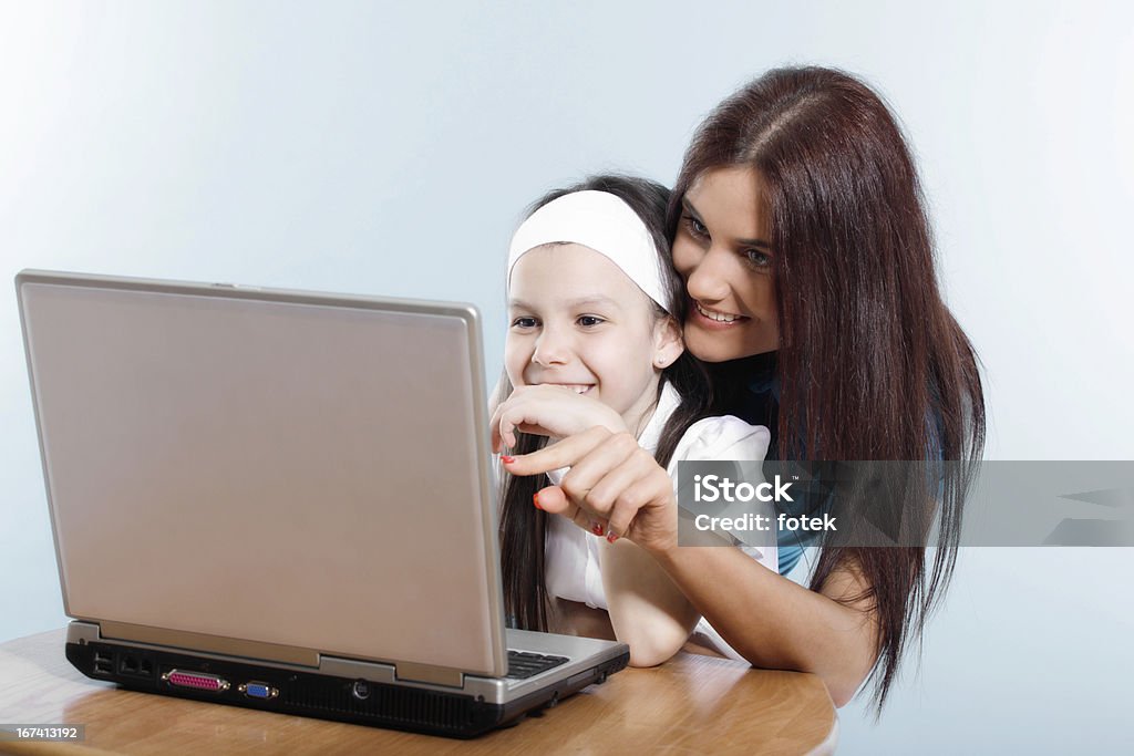 Working on laptop Family life series 2011 Stock Photo