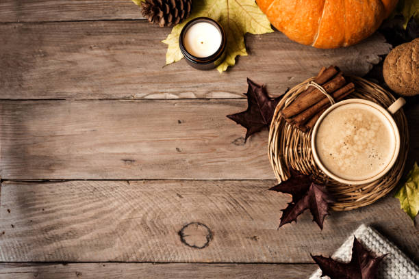 istock Autumn background with coffee and pumpkin 1674140130
