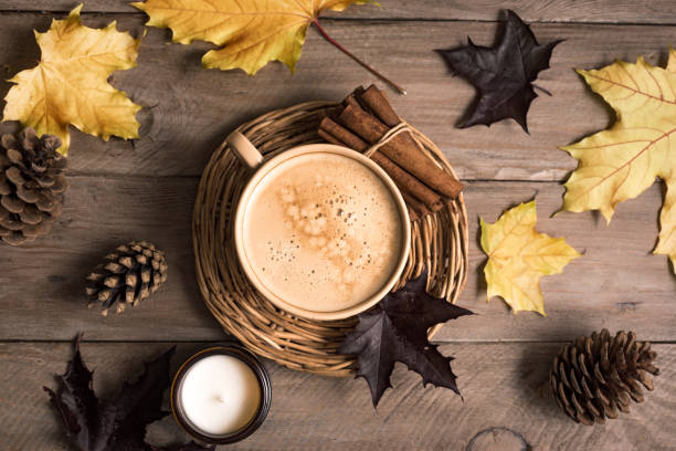 istock Autumn background - coffee and maple leaves 1674140170