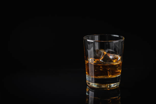 istock Whiskey with ice in glasses 1674141734