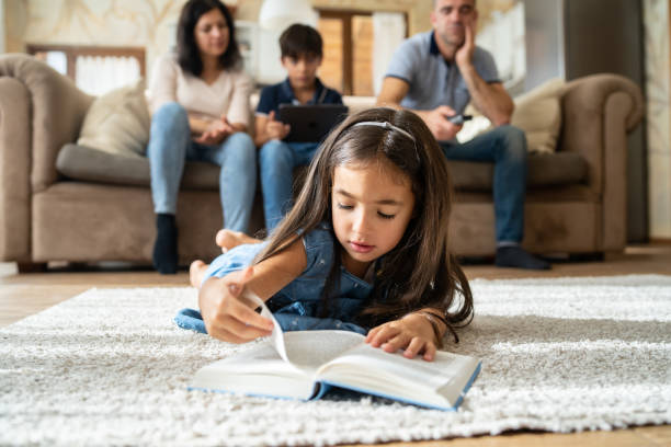 istock Young girl reading a book 1674142224
