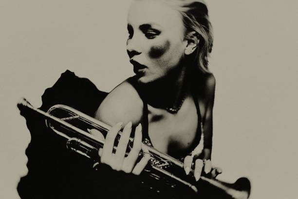 istock The female dancer with the trumpet. 1674143010