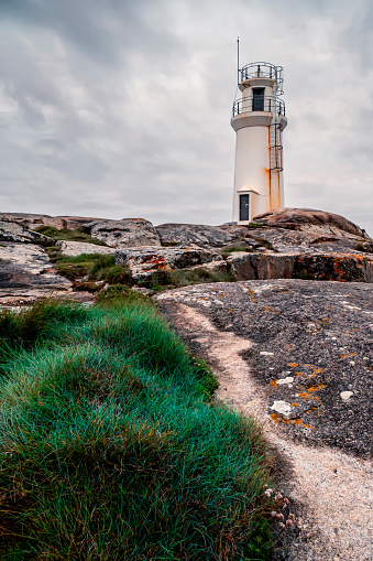 Lighthouse in the in Muxia Coast, Galicia, Northern Spain. This is one of the last stages in the jacobean route along with the visit to the cape of the Finisterre.