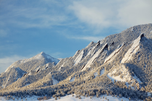 A winter snow on the Boulder Colorado Flatirons. 