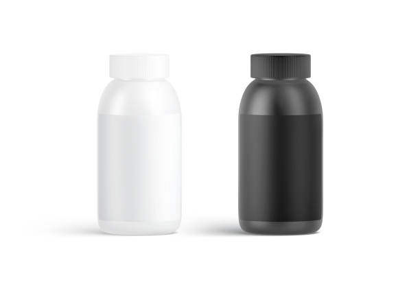 istock Blank black and white nutrition bottle with label mockup, isolated 1674166187