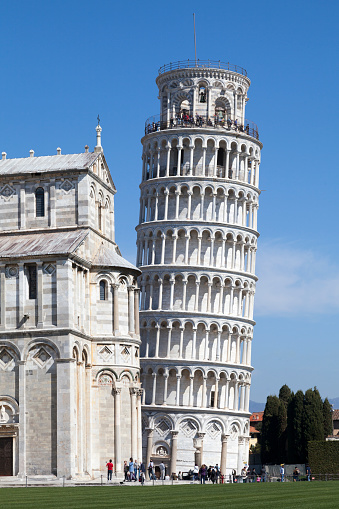 Pisa, Italy - March 31 2019: The Leaning Tower of Pisa (Italian: Torre pendente di Pisa) is the campanile of the Pisa Cathedral.