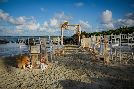 view of wedding decorations at the seaside for a ceremony