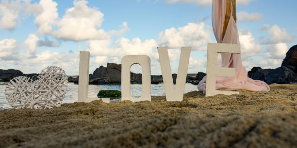 view of wedding decorations at the seaside for a ceremony