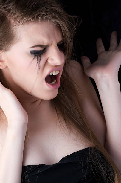 istock tearful woman screaming 167420074
