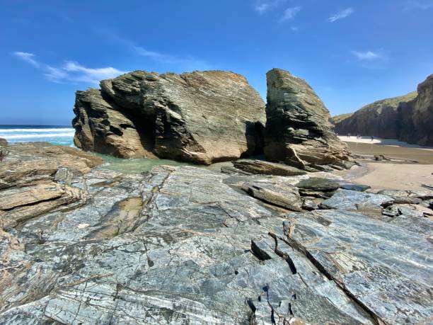 istock the beach of the cathedrals (praia das catedrais) displays dramatic eroded sea stacks during low tide. 1674203145