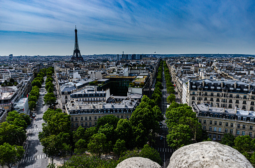 Arc de triomphe de l'Étoile. The Champs Elysées exits from this square. This photo was taken from the top of the Arc de Triomphe.