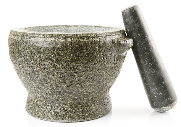 istock Granite mortar used for making sauces, isolated 167427124