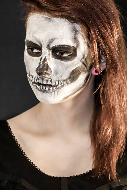 istock Beautiful woman with halloween mask 167427704