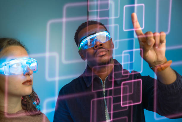 Two people looking at a digital screen with smart glasses