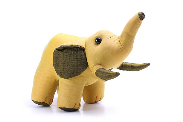 istock Thailand, Silk gold elephant doll isolated on white background 167429827