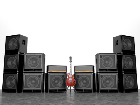 Electric guitar and many amplifiers  on white background