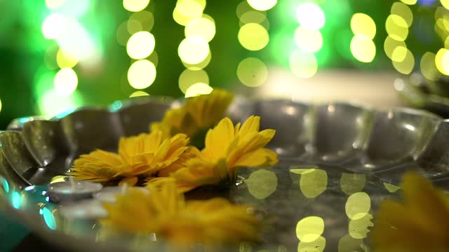 wedding decoration with yellow flowers and green foliage