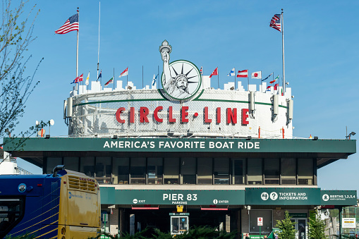 New York City, NY, USA-May 2022; Close up view of the building with signage of the Circle Line sightseeing cruises at Pier 83