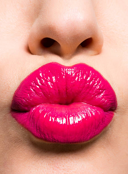 istock beautiful sexy red lips giving kiss 167436268