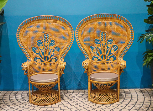 Apasara style rattan chair, clear lacquered rattan, leather seat.