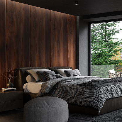 Modern matte black bedroom interior with large windows. Master bedroom interior.
Modern king size bed with black gloss side tables. 
Black carpet and ceiling with down lighters. Light stone marble flooring. 3d rendering.