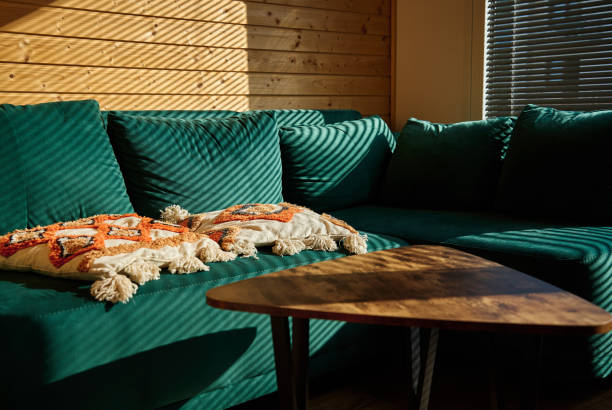 istock Living room interior with green sofa and coffee table 1674386040