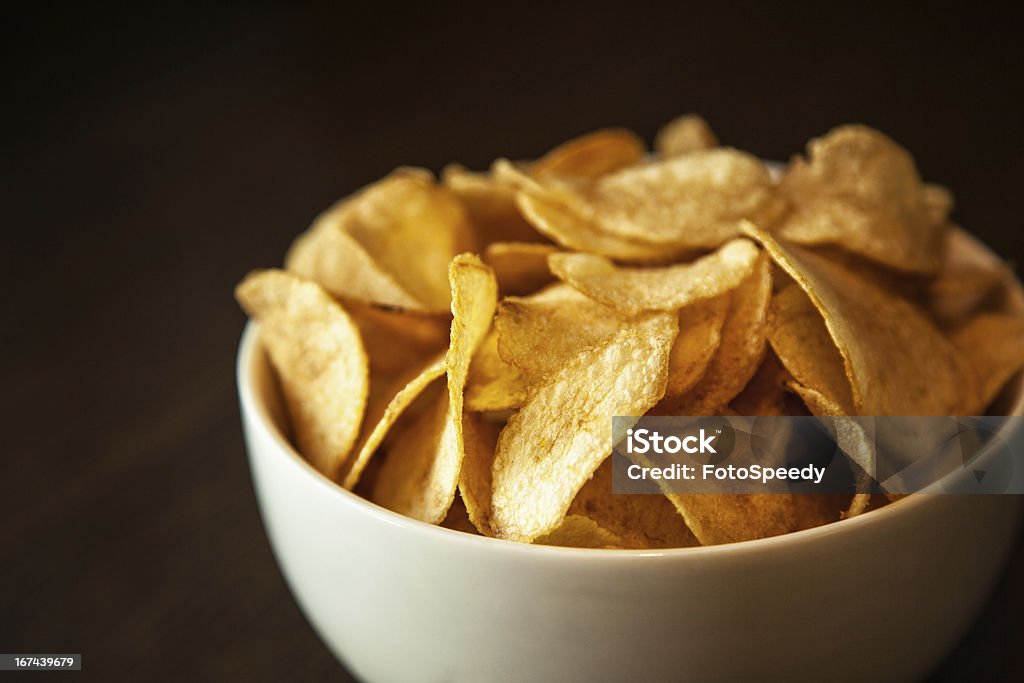 Potato chips Crispy potato chips in white bowl Potato Chip Stock Photo
