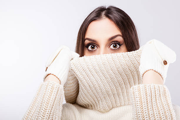 Young beautiful girl Portrait of a young beautiful girl with a turtle neck blouse on winter. large eyes stock pictures, royalty-free photos & images