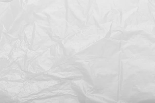 istock Crumpled grunge white plastic background texture, asset for graphic design 1674408218
