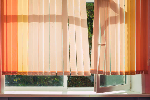istock Open window frame with shutters with blurry nature landscape outside 1674415498