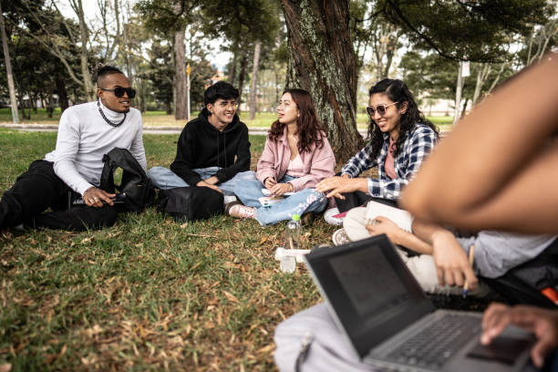 istock Young university students talking on the public park 1674443202
