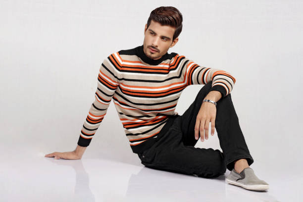 istock Male model posing in black suit 1674451307