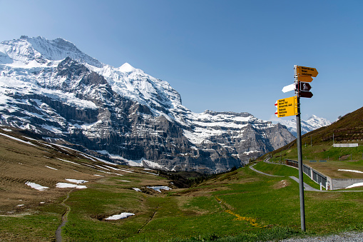 Lauterbrunnen, Switzerland - August 23, 2016: Village of Lauterbrunnen and its valley (Lauterbrunnental), with the well-known Staubbach Waterfall.