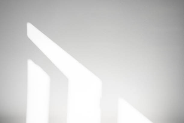 istock White wall concrete texture with abstract drop diagonal shadow. Sunlight overlay on white plaster paint on concrete floor,Light effect for Monochrome photo,mock up,poster, wall art,design presentation 1674457297