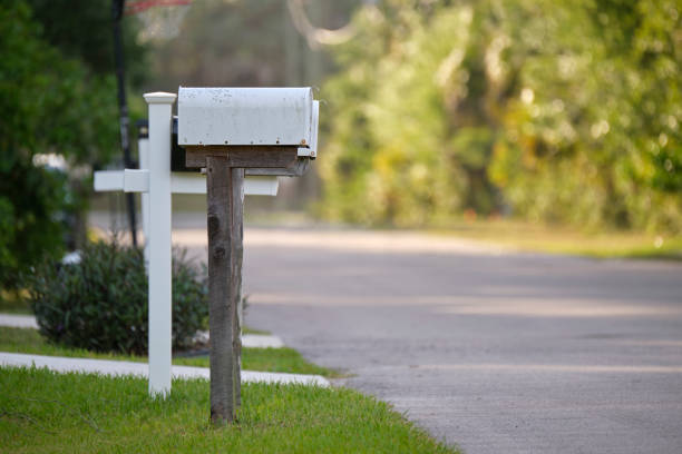 istock Typical american outdoors mail box on suburban street side 1674493457