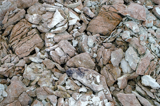 Dolomite stones quarry. Close-up of a rock structure at a dolomite mining site.