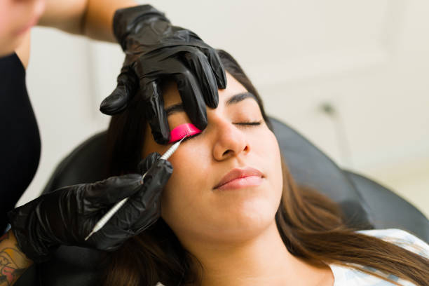 istock Latin beautiful client doing lash lifting in the beauty salon 1674494651
