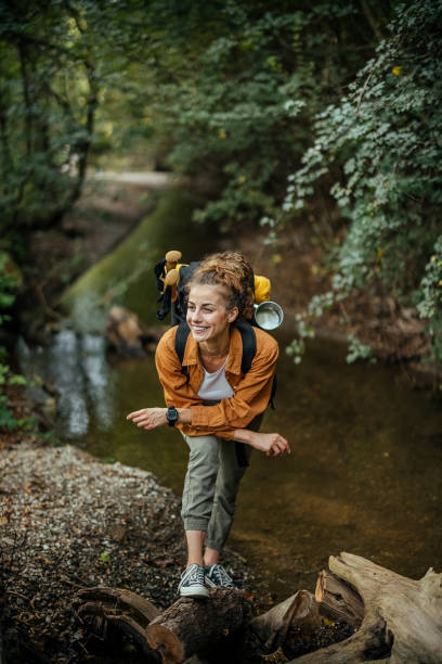 istock Woman explorer  in nature 1674495707