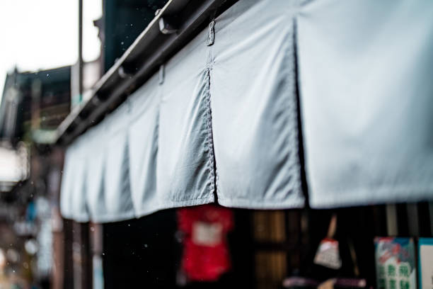 Exterior view of tiny japanese restaurant in Shinjuku district, Tokyo, Japan.