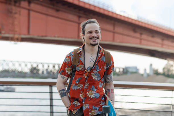 istock Portrait of a man with a skateboard 1674512480